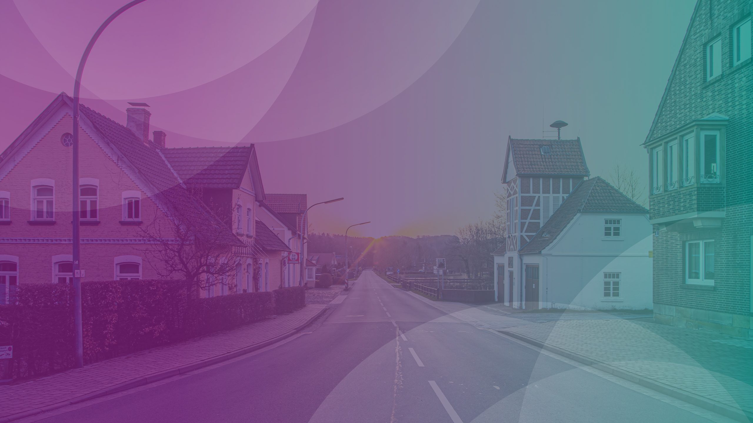 Banner of cute, quiet neighborhood with sunset in the background.